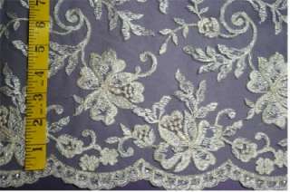   embroidered/beaded tulle fabric 52 wide Sold by the 1/2 yard  