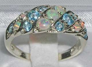 Fifteen VERY COLOURFUL AAA GRADE OPALS & BLUE TOPAZ measuring and 