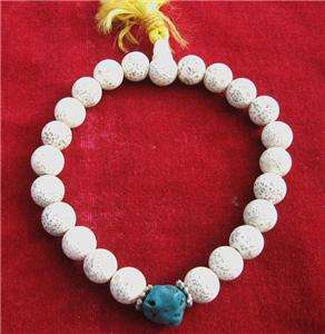 Bn1 Om Buddhist Tibetan Lotus Seed Turquoise color resin wrist Mala 