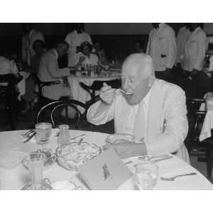  1937 photo House Minority Leader grabs hurried lunch 