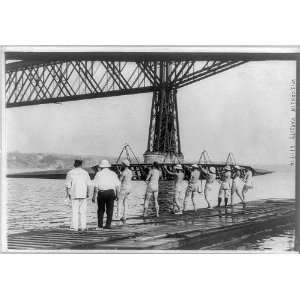   Rowing,Wisconsin Varisty,June 11,1914,men on pier holding racing shell