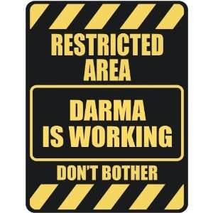   RESTRICTED AREA DARMA IS WORKING  PARKING SIGN