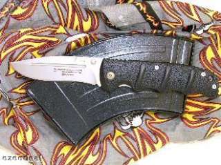   in usa this is not a automatic knife magnum kalashnikov packaged