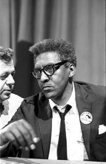 Bayard Rustin at news briefing on Civil Rights March on  