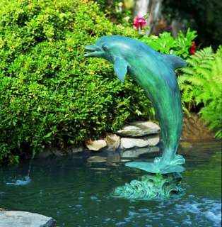the majestic lone dolphin fountain sculpture captures the grace of 