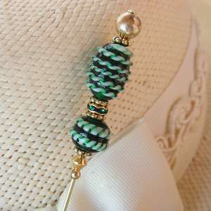 DECORATED GREEN GLASS & BRASS HATPIN   hat pins  