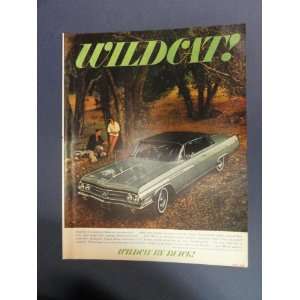 1963 Buick Wildcat. 1963 full page print advertisement. (car in woods 
