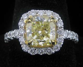 Fancy Yellow Cushion Diamond GIA Certified on 18k ring  
