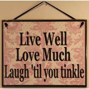 Black and Pink Sign Saying, Live Well Love Much Laugh til you tinkle 