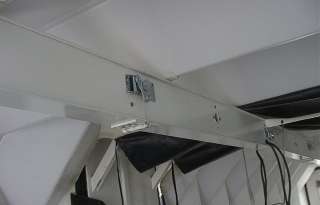   beams are hinged so that they fit into the center section for stowing