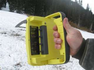 Searchers use the RECCO detector unit to find avalanche burial victims