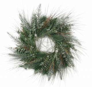 This artificial Christmas wreath has been accented with Eucalyptus 