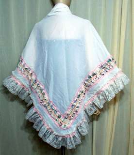 This is a fabulous new shawl. This is an off white velvet shawl 
