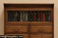 stacking 1900 era lawyer s bookcase has one section with a leaded 