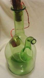 Up for sale is  Vintage Blown Green Glass Wine Decanter with Ice 