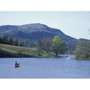 Canoeing on Little Long Pond, Parkman Mountain Spring, Maine, USA 