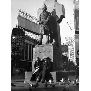  Pigeons and Visitors Relaxing at Father Duffys Monument 